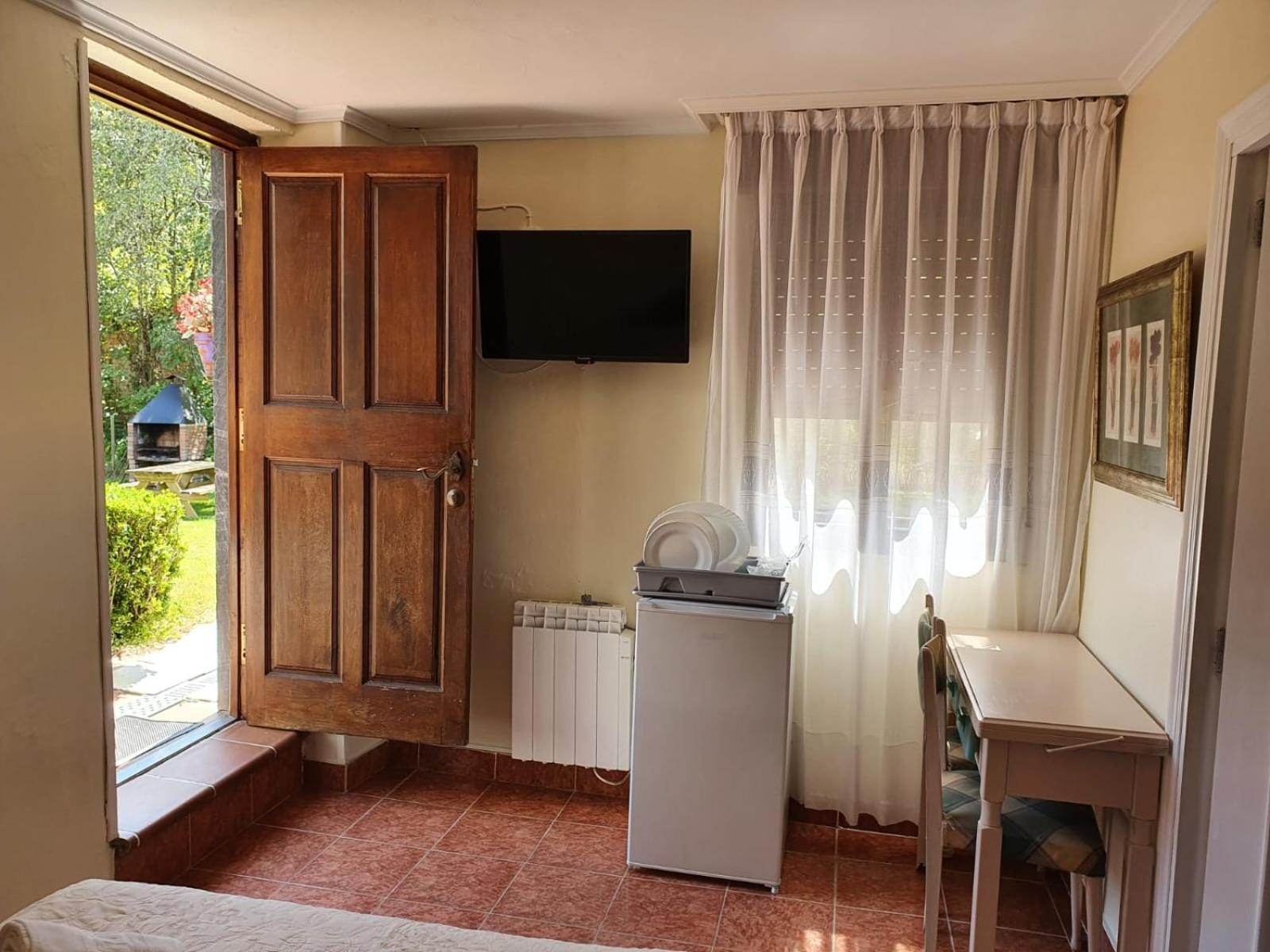 Alojamiento Con Jardin Y Barbacoa Onís Rom bilde